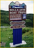 Sign post for Bella Boat Trips and Aquaxplore